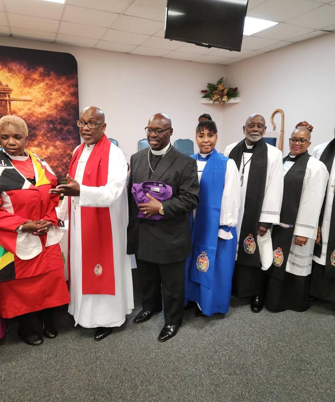 Clergy standing in a line after a ministry ceremony